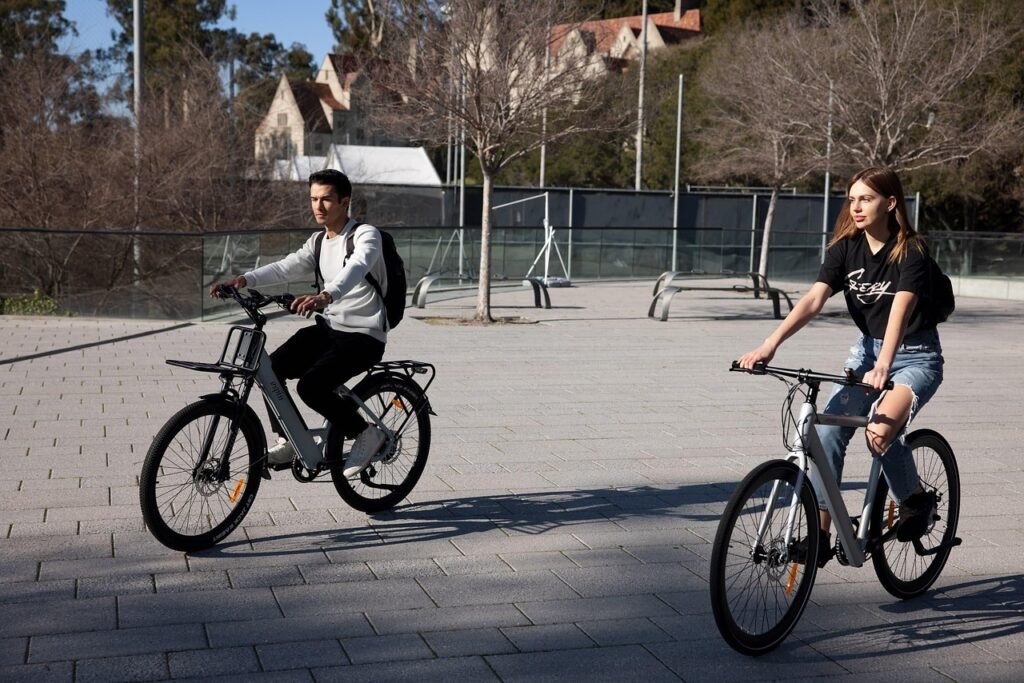 People using electric bikes for everyday city riding